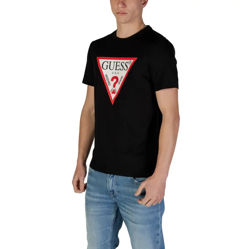 Black Guess men t-shirt featuring a bold red and white triangular logo with the brand name prominently displayed