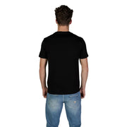 Guess men t-shirt black short-sleeved crew neck made of soft cotton worn by a model