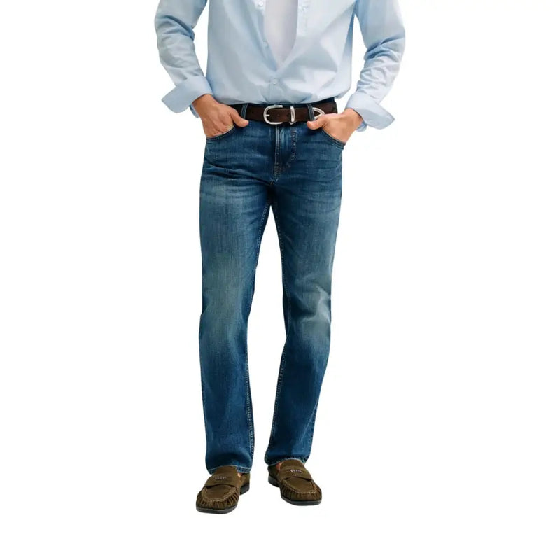 Blue denim jeans with classic straight-leg cut and subtle fading combined with Guess men trousers beige cotton blend angels slim fit