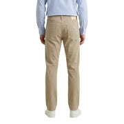 Beige guess men trousers made of cotton blend showing the back side with classic five-pocket design and subtle logo