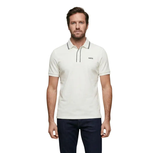 Cream-colored Guess men short sleeve cotton blend polo shirt with black trim on collar and placket