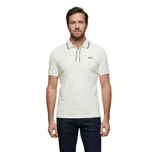 Cream-colored Guess men short sleeve cotton blend polo shirt with black trim on collar and placket