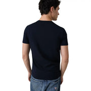 Back view of guess mens extra slim black cotton crew neck t shirt with subtle logo on lower back