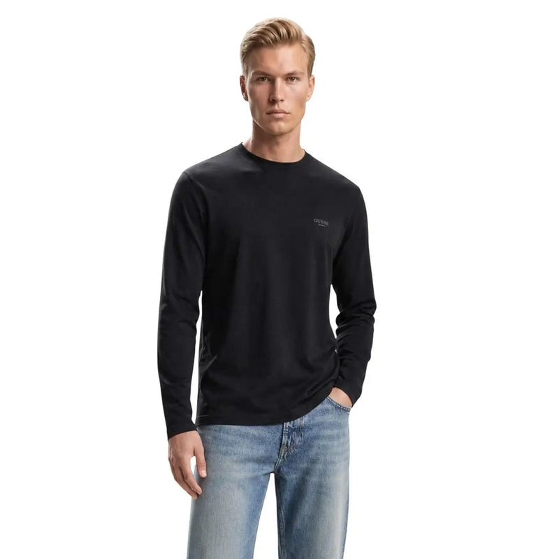 Black long-sleeved crew neck cotton t shirt with subtle embroidered logo on left chest by Guess mens slim fit