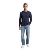 Guess mens navy blue slim fit long-sleeved cotton t shirt with crew neck and subtle logo on the left chest