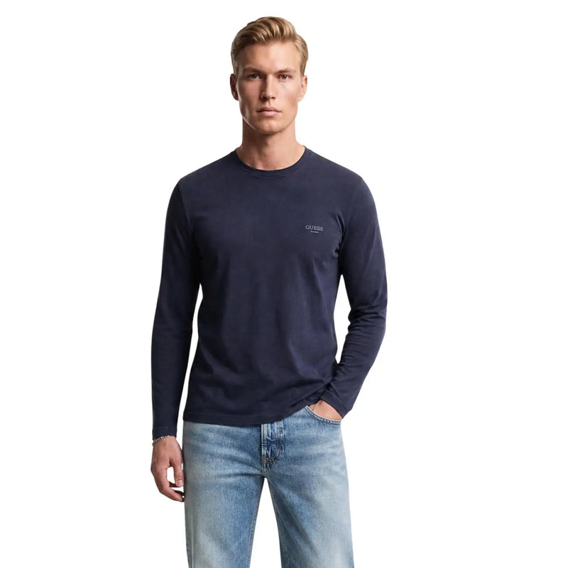 Navy blue slim fit cotton long-sleeved crew neck t-shirt with subtle embroidered Guess logo on left chest