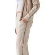 Beige Guess women modal blend sweatpants with black vertical north sails branding along side seams