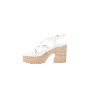 Beige guess women sandals with white platform cork heel and multiple crisscross straps for stylish comfort