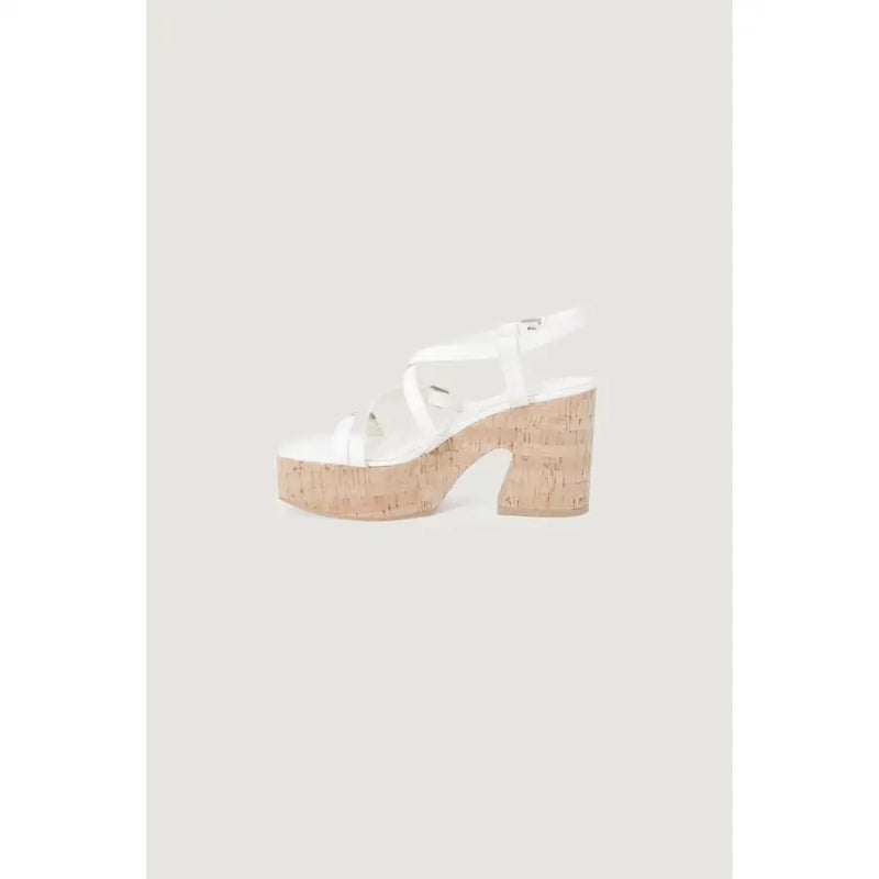 Guess women beige platform sandals with block heel featuring thin straps and cork sole and heel viewed from the back