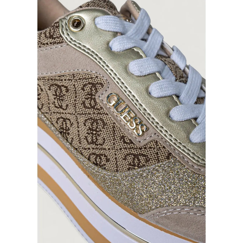 Guess women beige polyester slip on sneakers featuring gold glitter, brown patterned fabric, light blue laces, and metallic logo