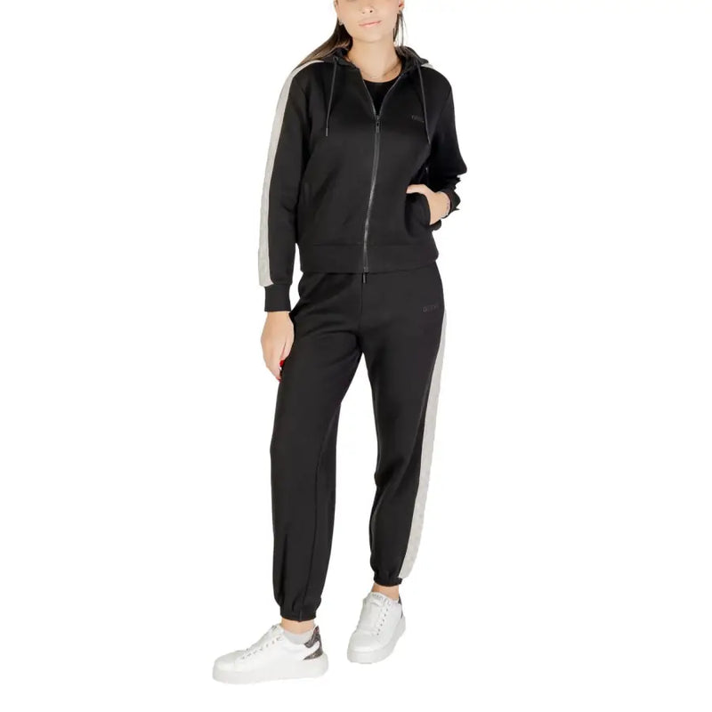 Guess women black hooded zip sweatshirt cotton polyester with gray side stripes and matching joggers front view