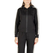 Black guess women hooded zip sweatshirt in cotton polyester with gray side panels and a subtle chest logo