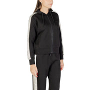 Guess women black hooded zip sweatshirt in cotton polyester with silver stripes down sleeves and matching drawstrings