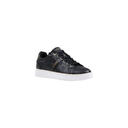 Black guess women slip on polyurethane sneaker with subtle embossed logo pattern and white rubber sole