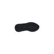 Black rubber sole with textured triangular tread pattern on the back of Guess women black sporty slip on sneakers
