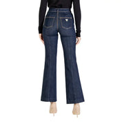 Women’s dark wash flare jeans with back zipper and pointed-toe heels from Guess Women Blue Jeans Fall Winter collection