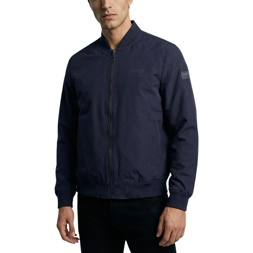 Marineblau Guess Damen-Bomberjacke aus Polyester mit dezentem, gesticktem Logo und Reißverschlusstaschen in elegantem, modernem Design