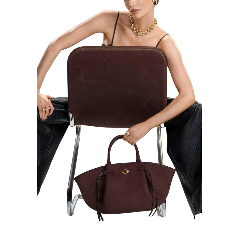 Guess women brown polyester satchel bag featuring a rich burgundy suede tote design with gold-tone clasp and drawstrings