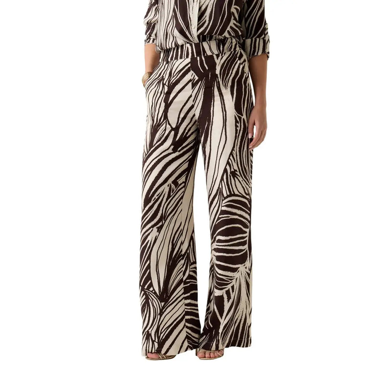Guess women brown viscose trousers featuring brown and cream zebra-striped wide-leg design from spring summer collection