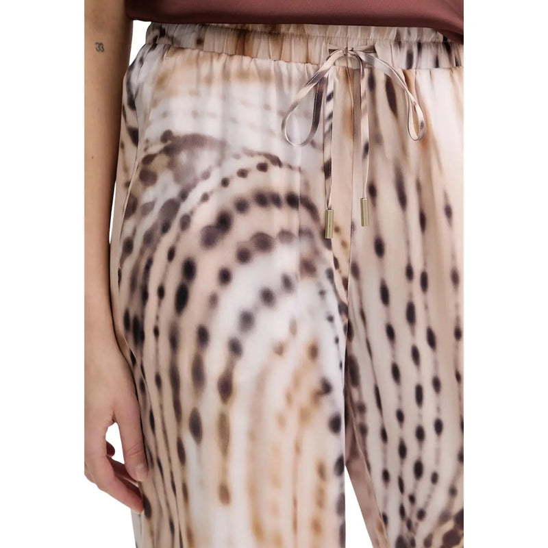 Guess women Dalia fluid jogger pant in beige lyocell with beige and brown tie-dye high-waisted trousers and drawstring waistband