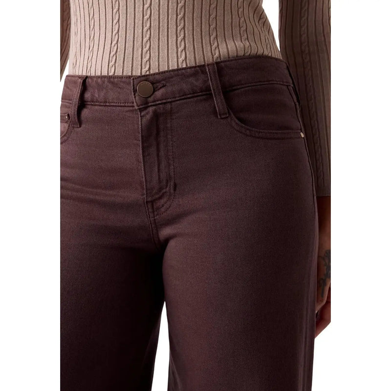Dark brown high-waisted slim fit jeans with subtle stitching details complement Guess women sexy palazzo trousers