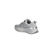 Guess women silver sneaker featuring polyester mesh with metallic accent stripe and chunky sole for casual wear