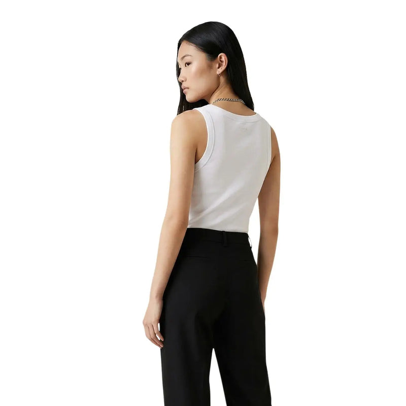 White sleeveless cotton tank top by Guess featuring a round neck and smooth fabric with a clean design