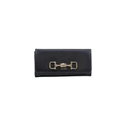 Black Guess women wallet in polyurethane with silver horsebit clasp and button closure measuring 20x10x4 cm