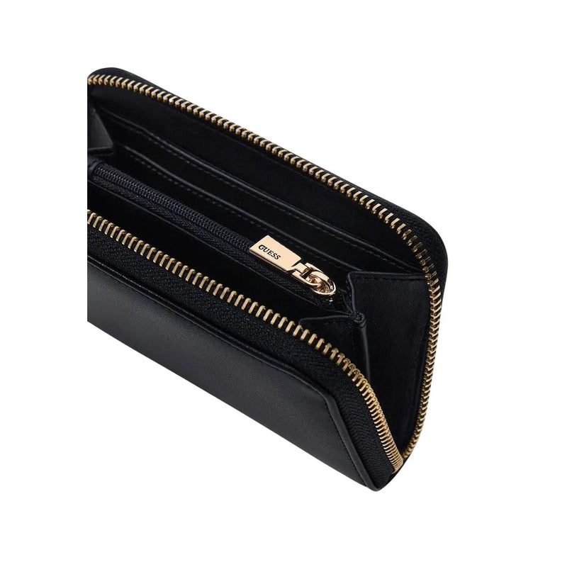 Guess women black zip polyurethane wallet with gold-tone zipper and hardware measuring 14x9x3 centimeters