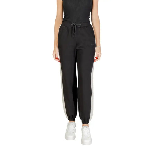 Guess Women black joggers with white side stripes and drawstring waistband