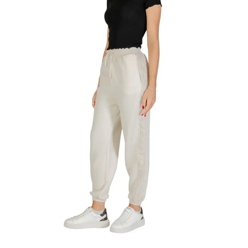 Guess Women white cotton polyester joggers with drawstring waist and ribbed cuffs