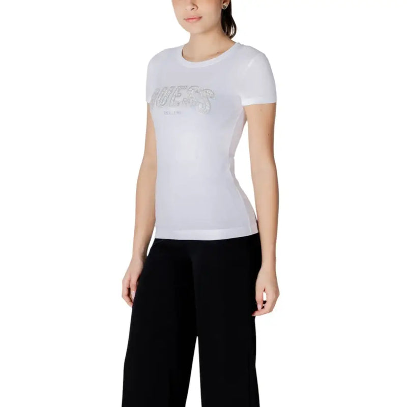 White Guess women cotton short sleeve t-shirt with silver glitter lettering across the chest