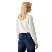 Guess women white knitwear batwing viscose blend sweater with long sleeves worn with dark blue jeans front view