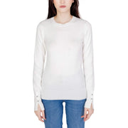 Guess women white long cotton knitwear featuring long sleeves with subtle ribbed cuffs and button details for fall winter