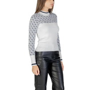 Women wearing Guess White Long Print Knitwear with long sleeves and black leather pants