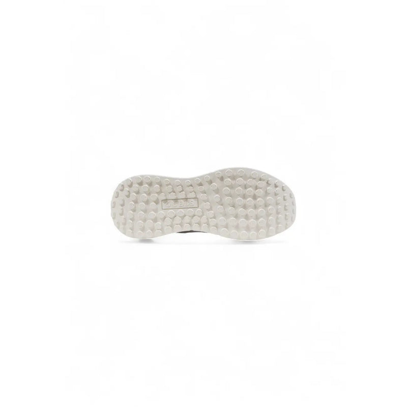 White rubber sole with circular tread and central label of guess women white platform sneakers fall winter