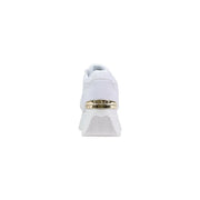 White Guess women platform sneaker featuring gold-tone metallic accent band and textured wave-patterned sole