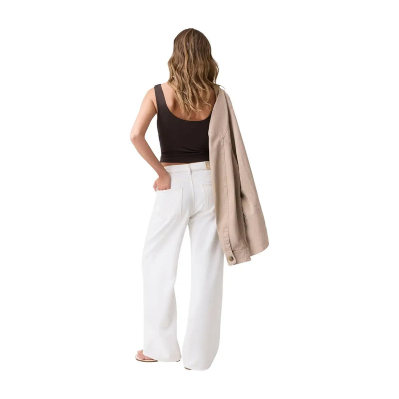 Guess women wide leg ankle trousers in white cotton lyocell showing wide leg design and ankle length fit