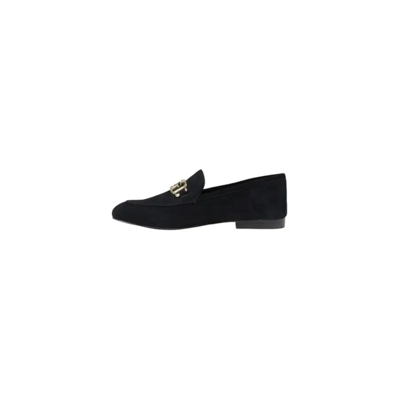 Guess women’s black leather moccasin flats featuring black suede loafer design with gold tone metal buckle