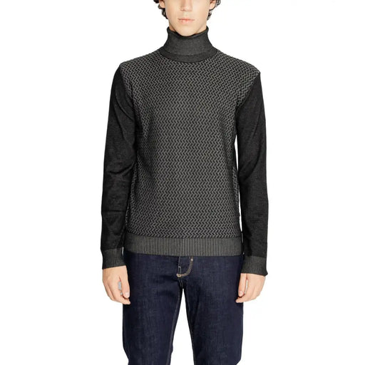 Black and gray textured turtleneck sweater with ribbed cuffs and hem, possibly ralph lauren.