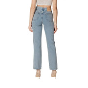 High waisted light blue denim jeans shown from the back with light wash fabric straight leg cut and classic pockets