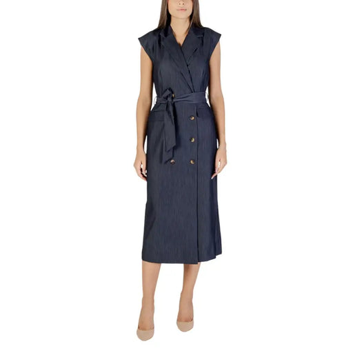 Navy blue sleeveless double-breasted dress with belt and subtle vertical pinstripes for fall winter by Ichi