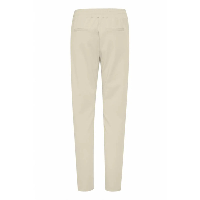 Beige slim-fit Ichi women trousers with soft tailored fabric and subtle lace front back pockets shown from the back side
