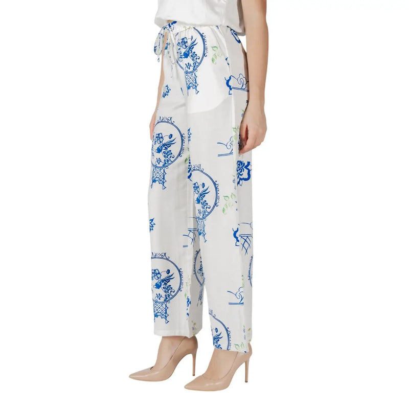 Ichi women’s white wide-leg trousers with blue and green porcelain inspired circular pattern and lace details for spring summer