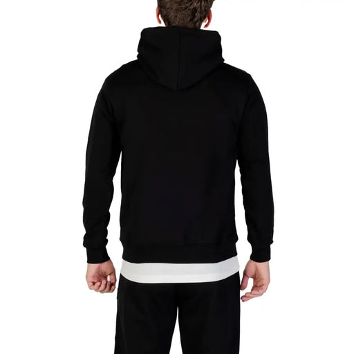 Icon Schwarzer Herren-Kapuzenpullover aus Baumwollmischgewebe mit weißem Querstreifen am Bund, von hinten gesehen