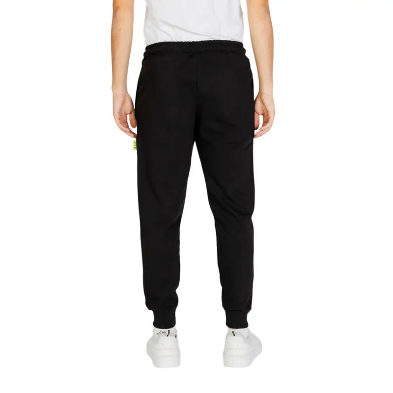Black jogger pants with drawstring waistband and ribbed cuffs from Icon men laced printed trousers for fall winter