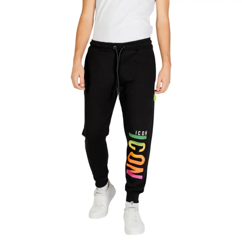 Icon men black laced printed trousers for fall winter with rainbow icon logo on leg and green tag near waistband