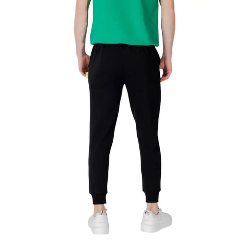 Icon men black striped cotton blend casual jogger pants with elastic cuffs and a subtle yellow side seam tag