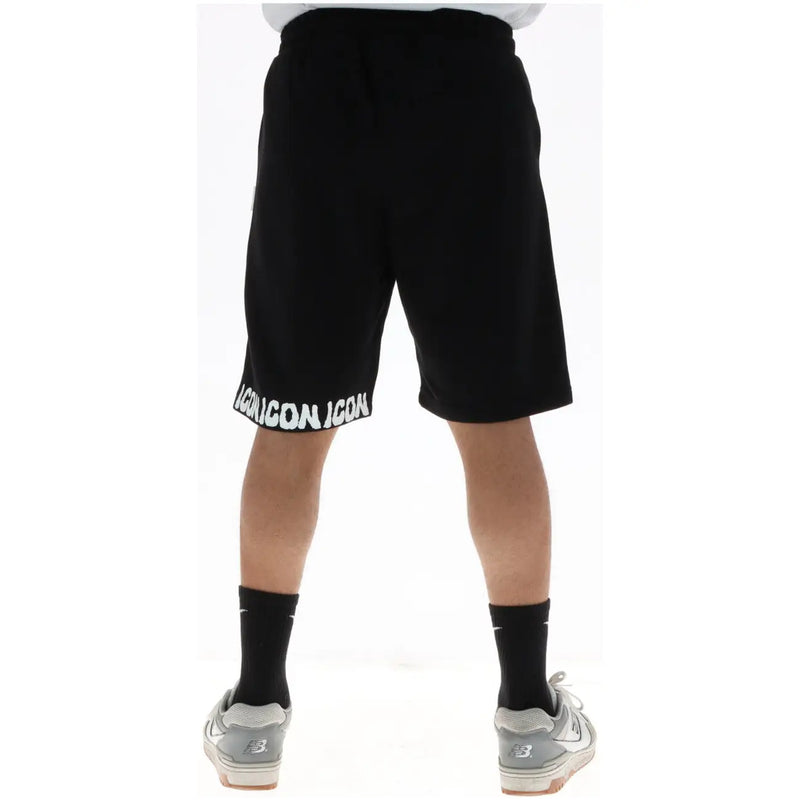 Icon shorts athletic shorts for men in black with white icon icon lettering along hem, front view