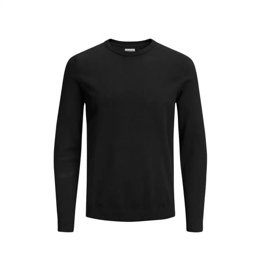 Black long-sleeved crew neck sweater with ribbed cuffs and hem, likely made of cotton or a similar soft material.